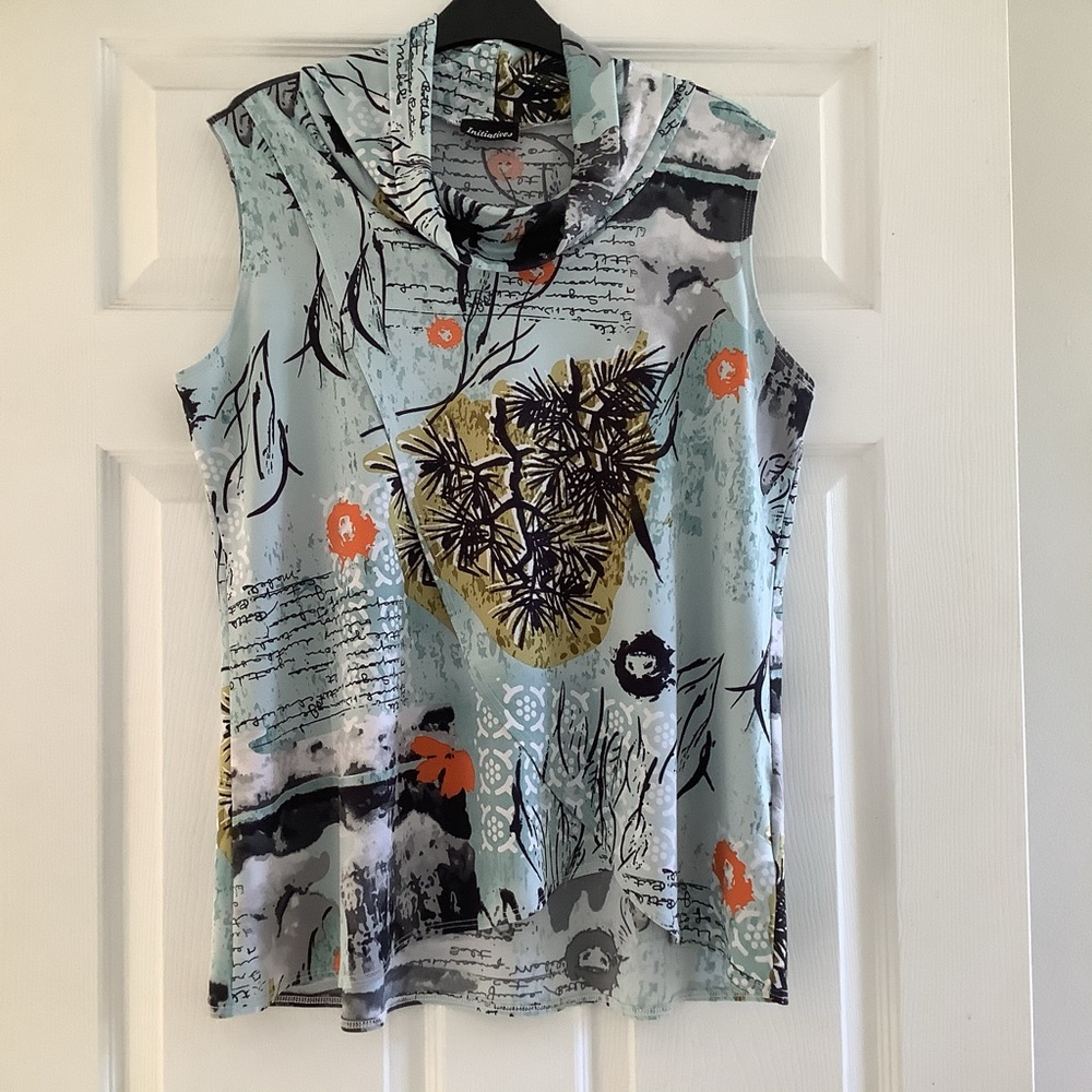 Woman’s sleeveless top by “initiatives”